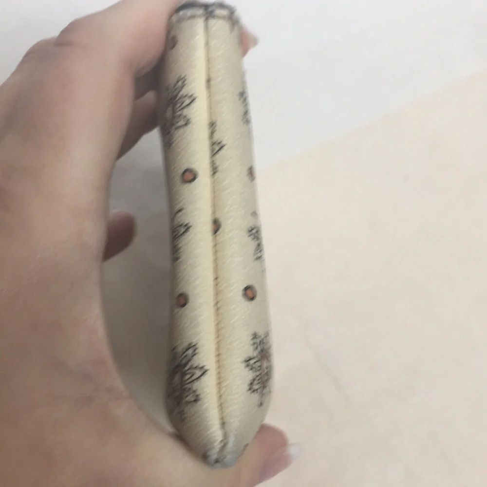 CORNER ZIP WRISTLET IN FOREST BUD PRINT